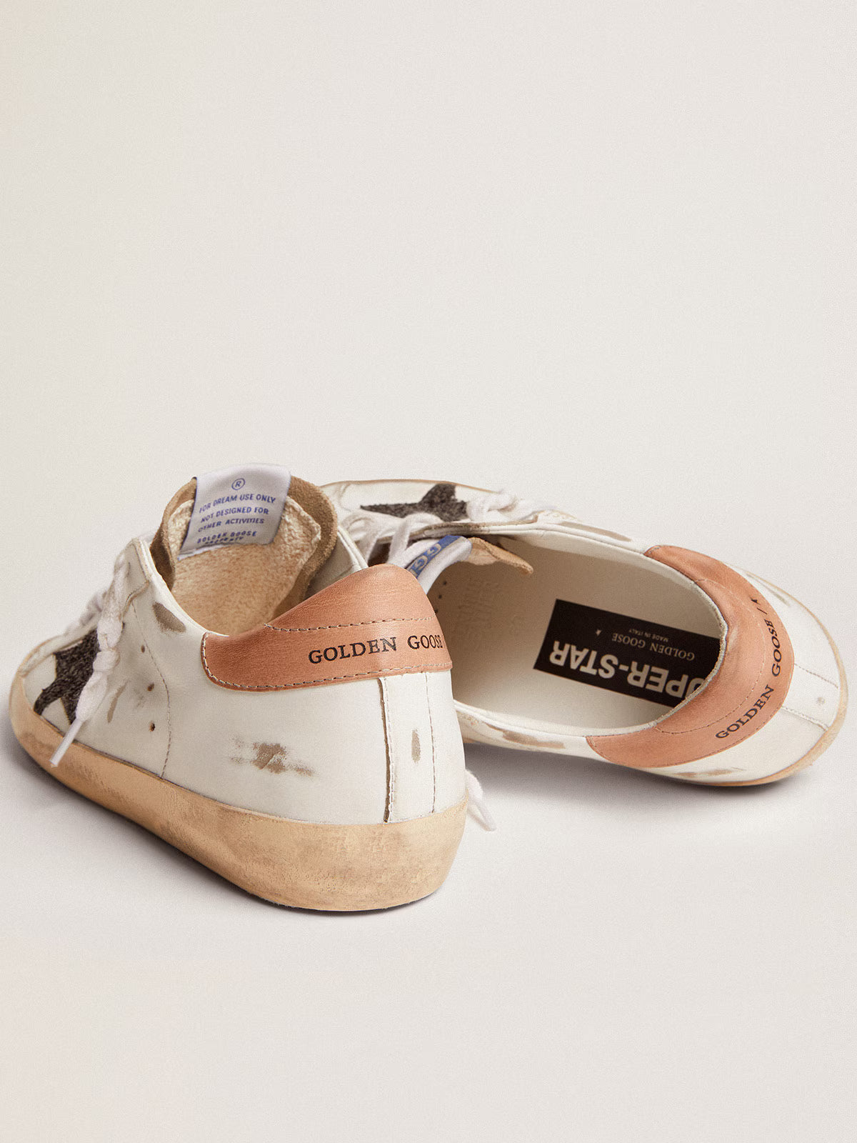 Super-Star femme avec étoile à paillettes noires et contrefort rose