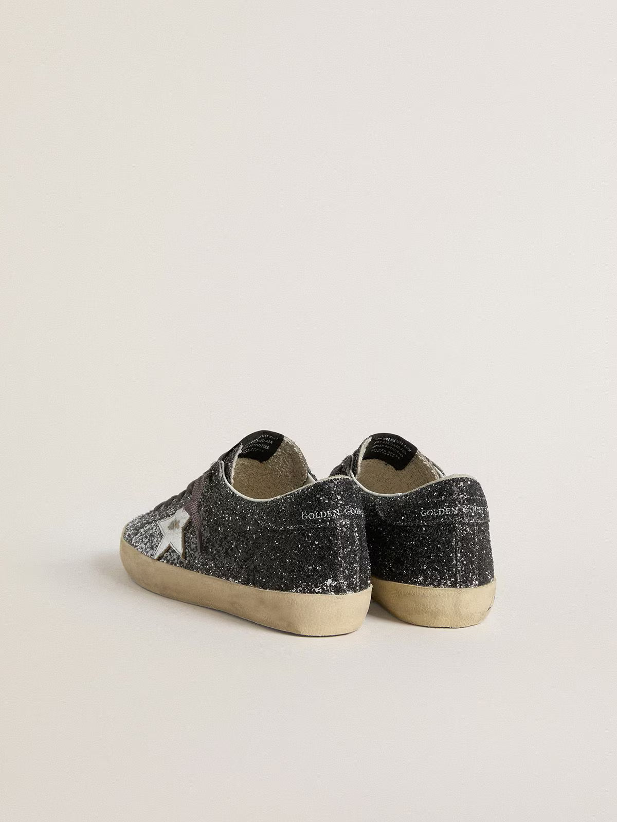 Super Star pour femme avec tige à paillettes et étoile en cuir lamé argentés